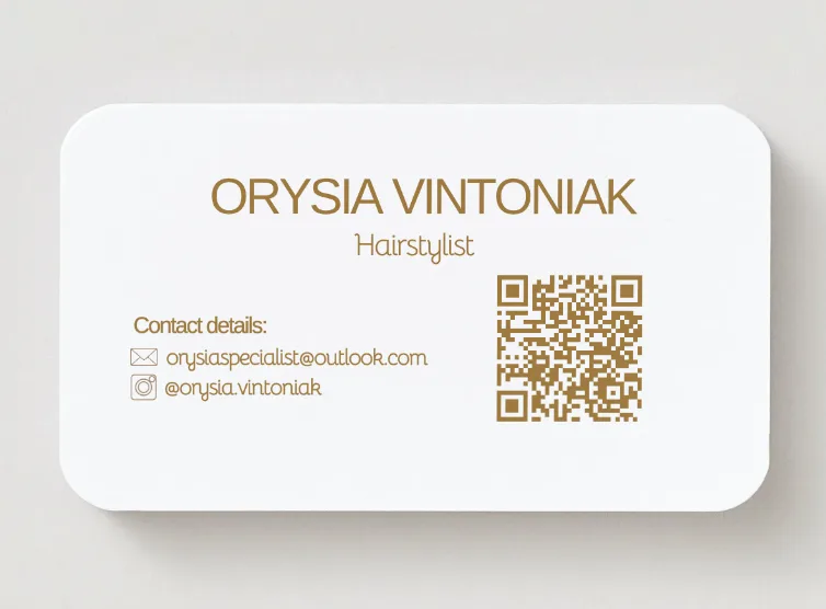 Back side of Orysia Vintoniak business card with contact details and QR code.